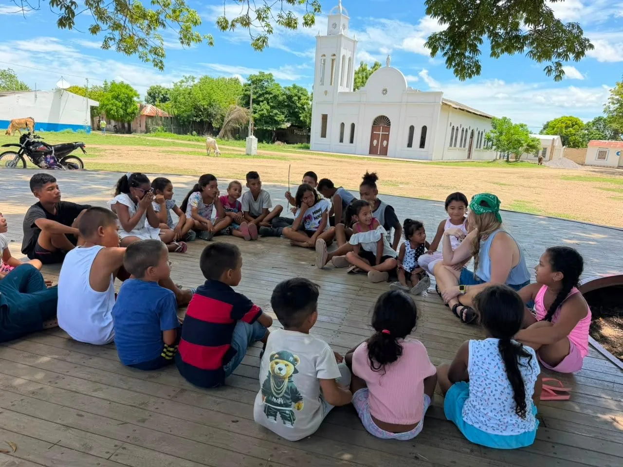 Children taking part in a group activity in the town square